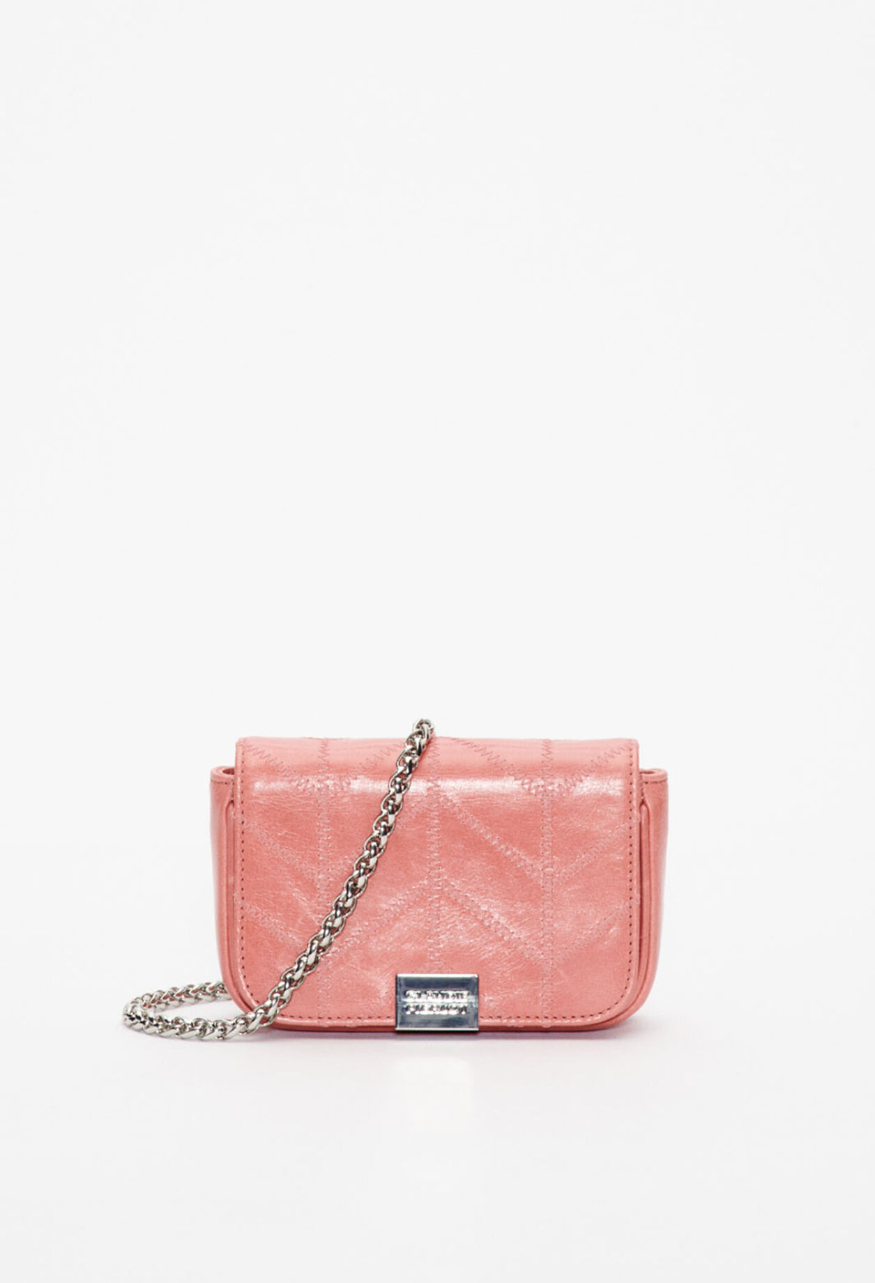 White patent leather clutch bag
