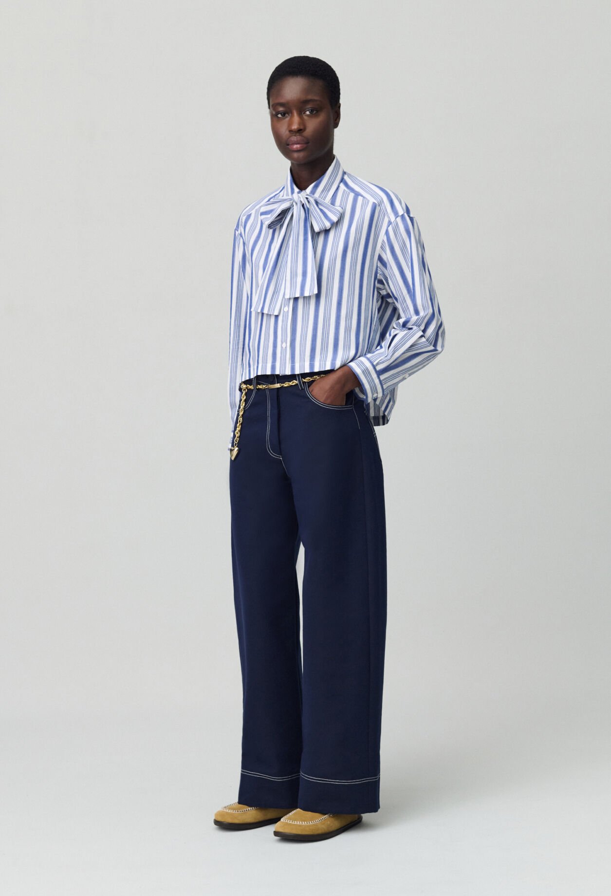 Striped shirt with bow collar