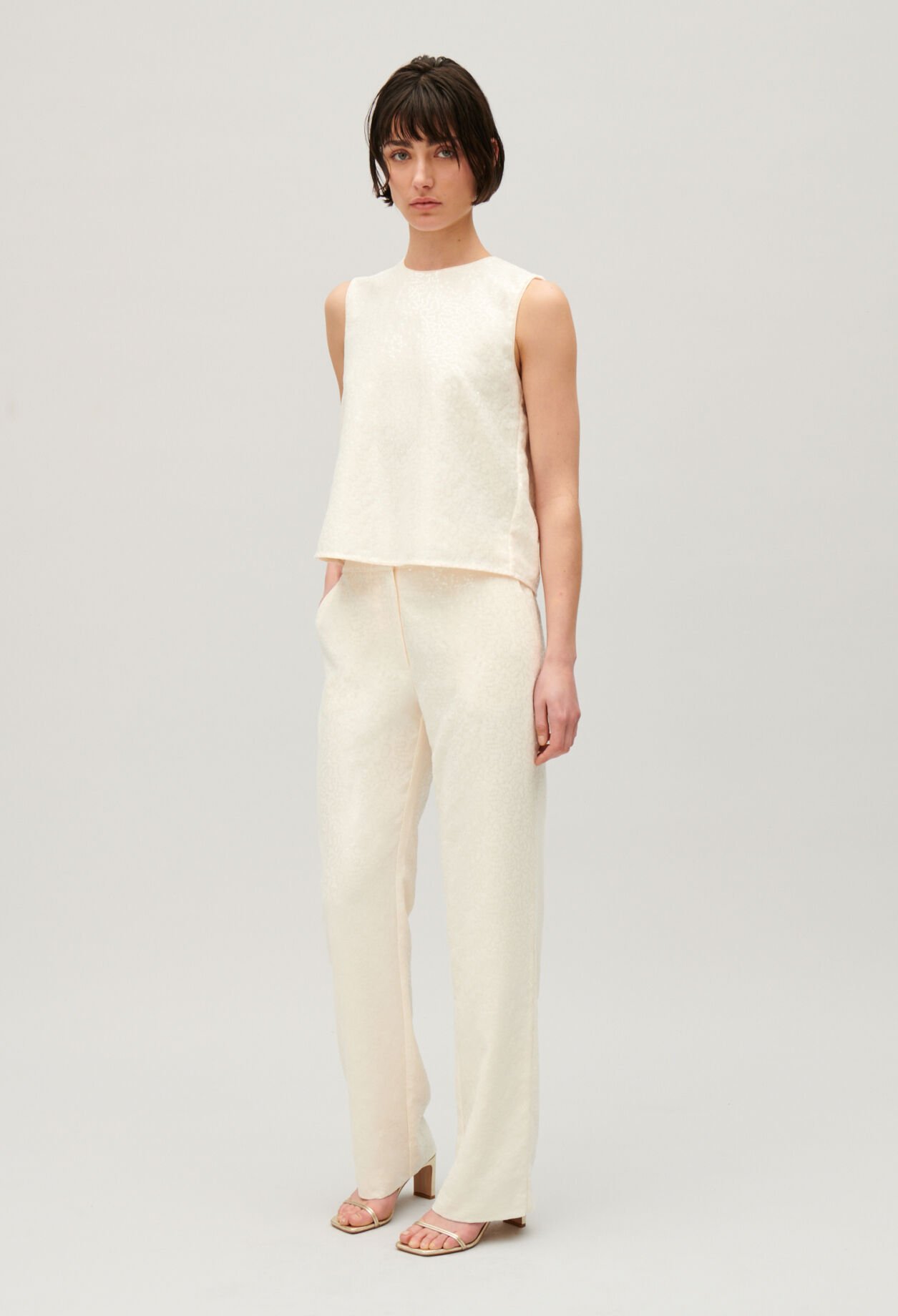 Ecru sequinned trousers