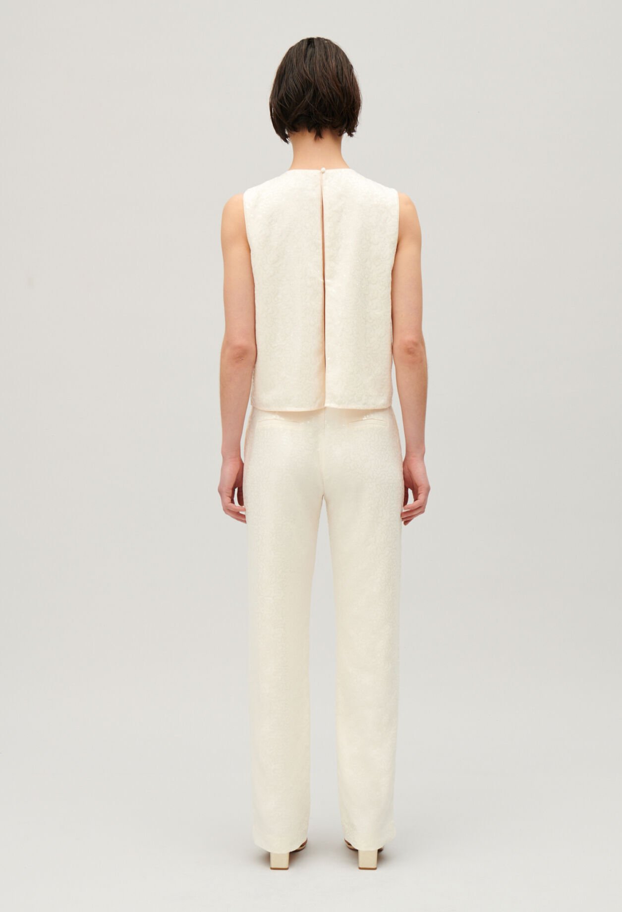 Ecru sequinned trousers
