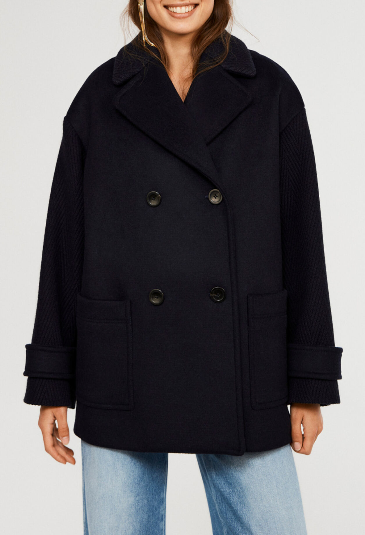 Dual-material coat from recycled wool