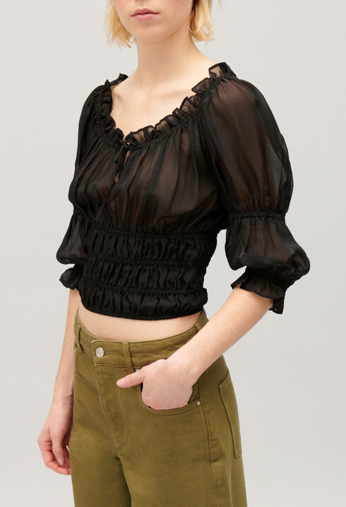Short black ruffled blouse