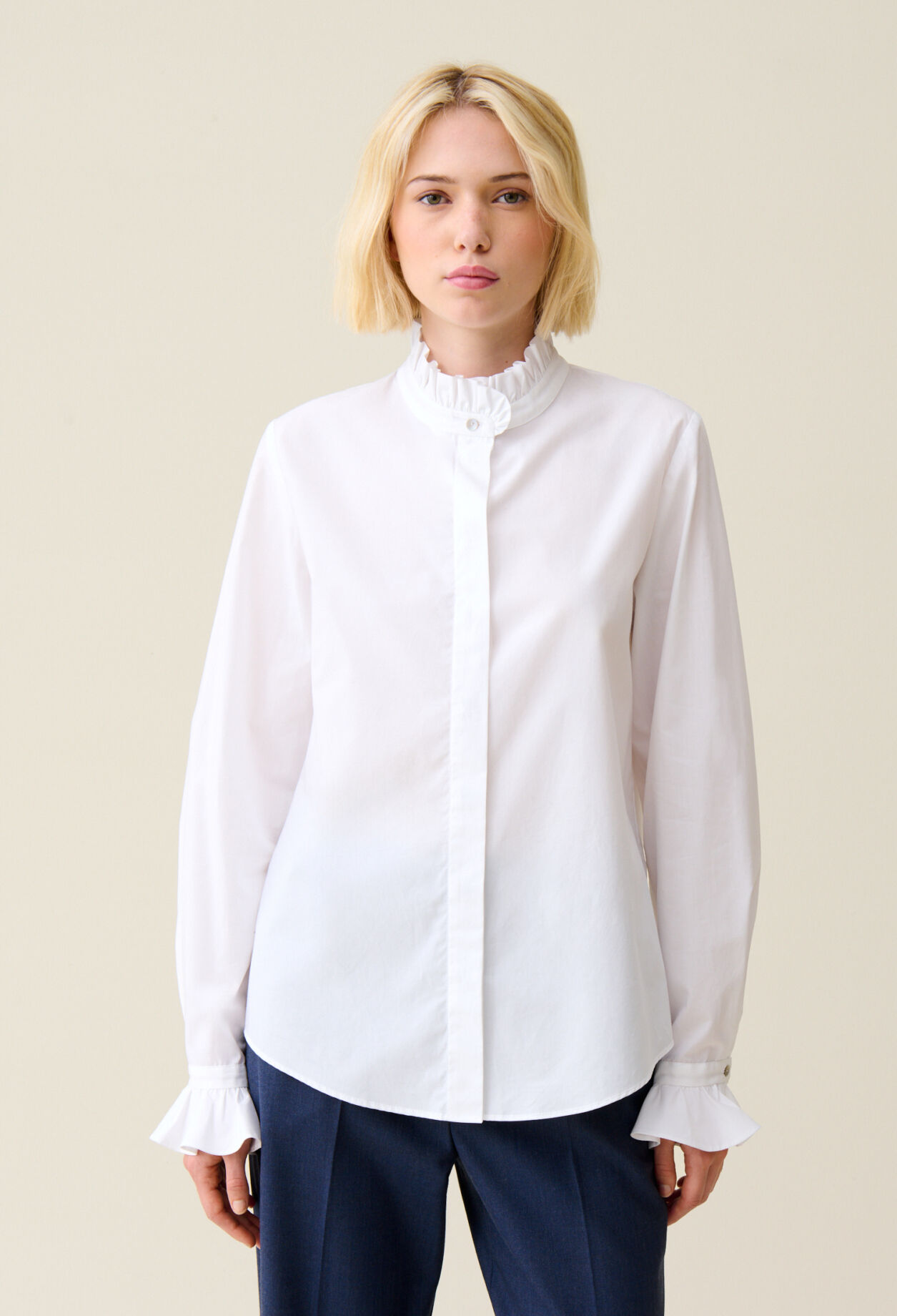 White shirt with ruffled collar