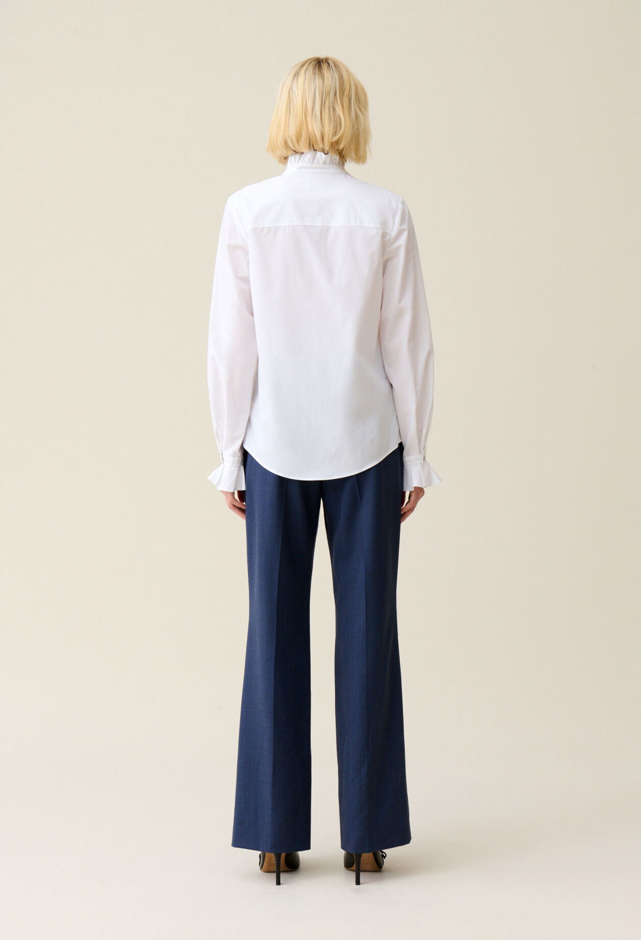 White shirt with ruffled collar