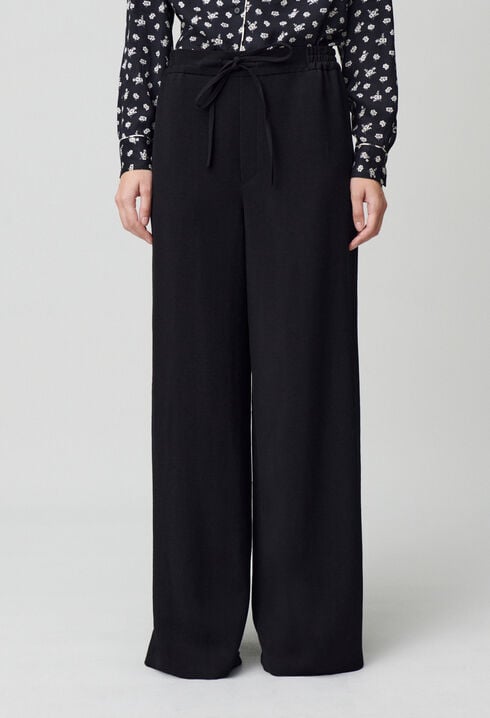 Elasticated fluid trousers
