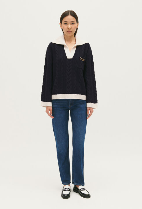 Navy blue cable-knit jumper