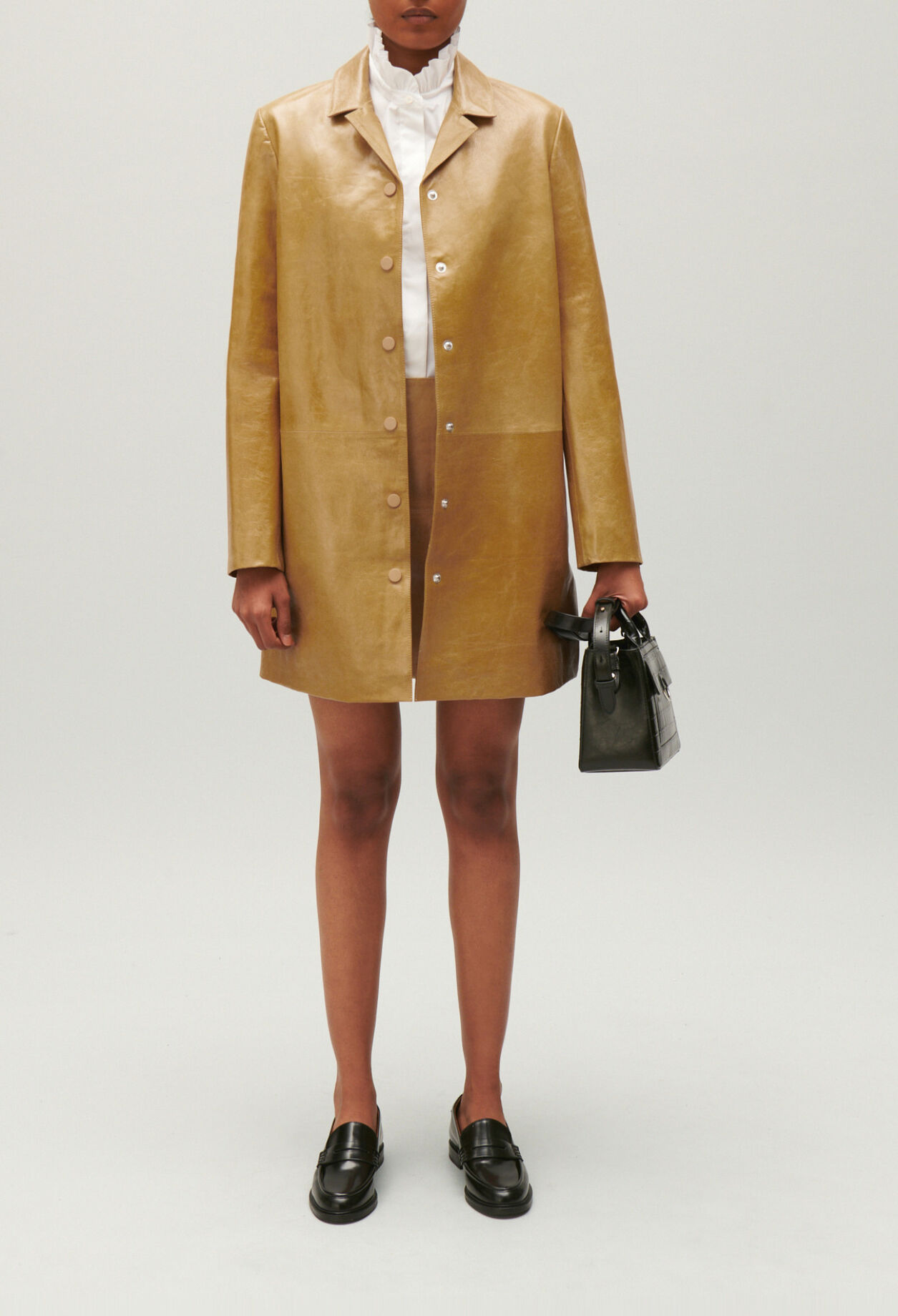 Ochre yellow long leather jacket