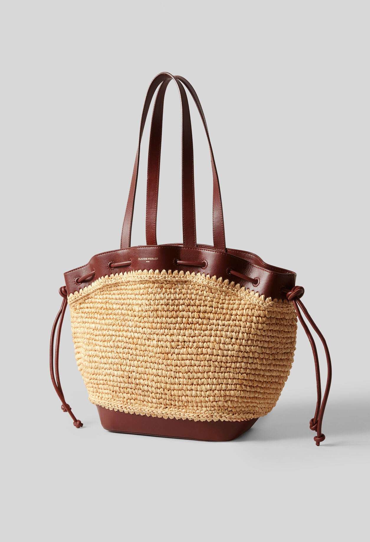 Raffia and leather basket