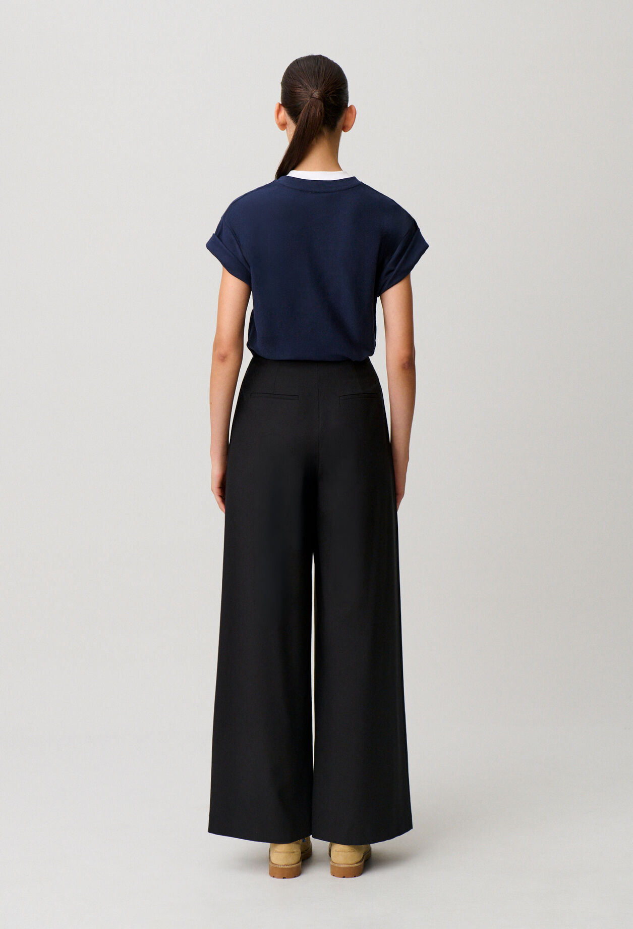Black pleated wide-leg trousers