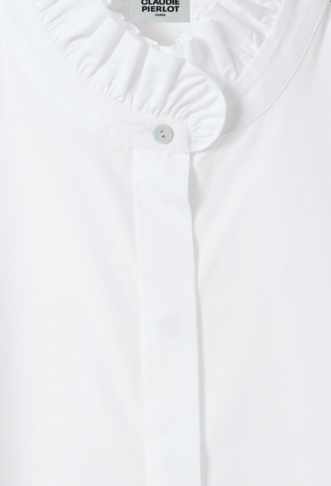 White shirt with ruffled collar