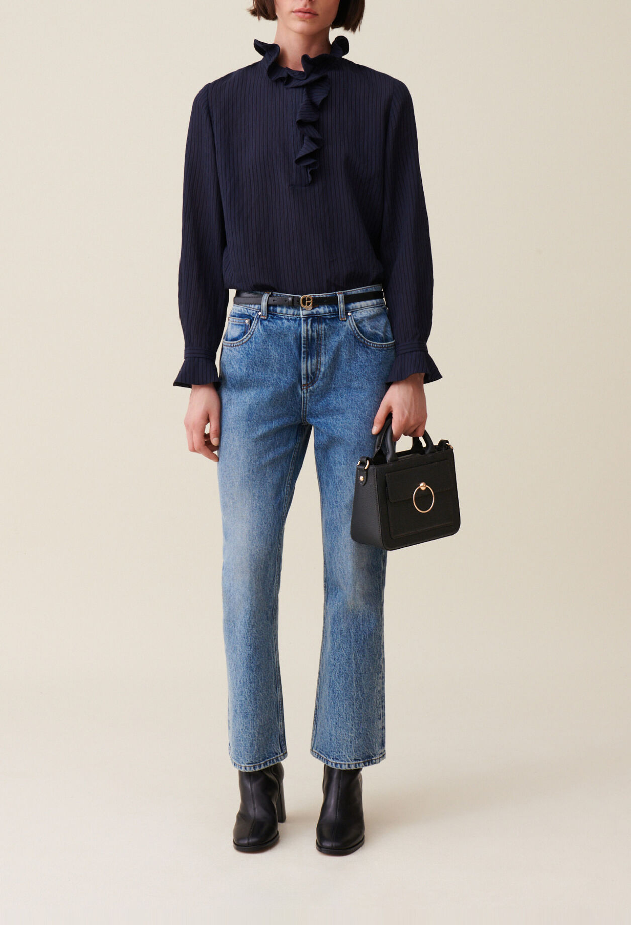 Dark blue striped ruffled blouse