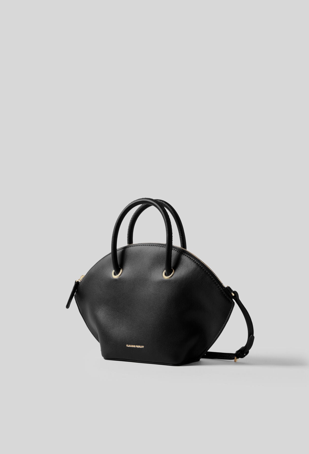 Smooth leather bag with gold rings