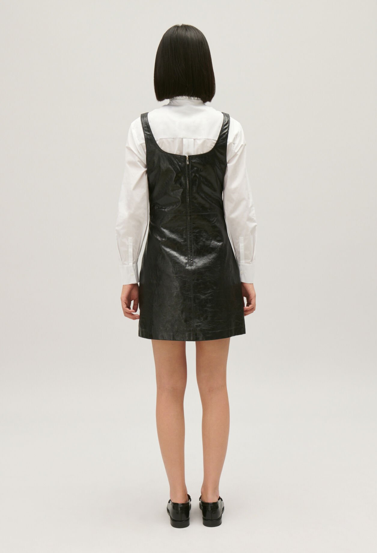 Short black leather tunic dress