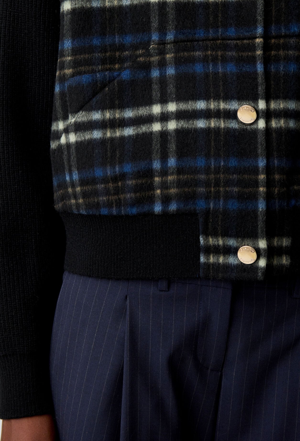 Striped bi-material jacket