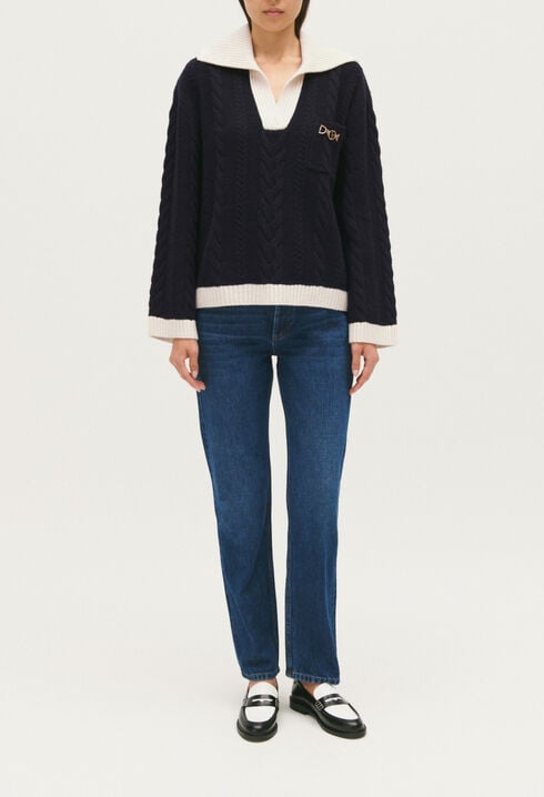 Navy blue cable-knit jumper