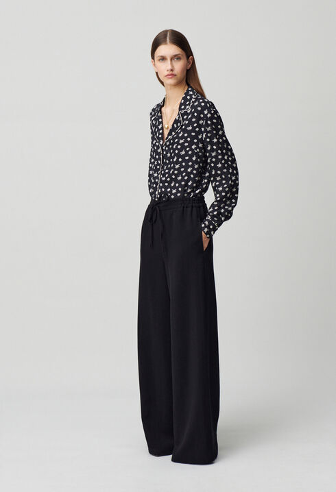 Elasticated fluid trousers