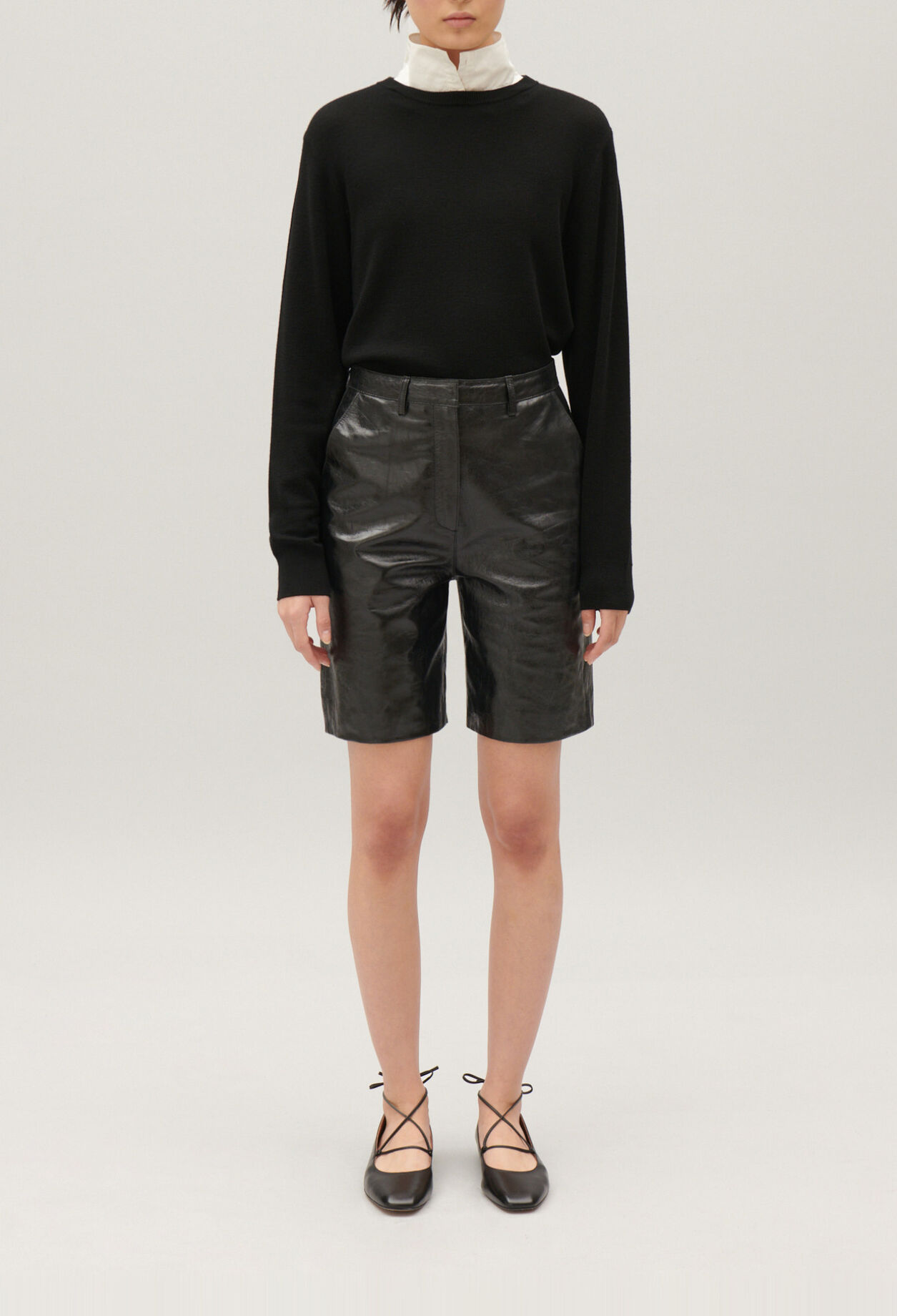 Black leather Bermuda shorts