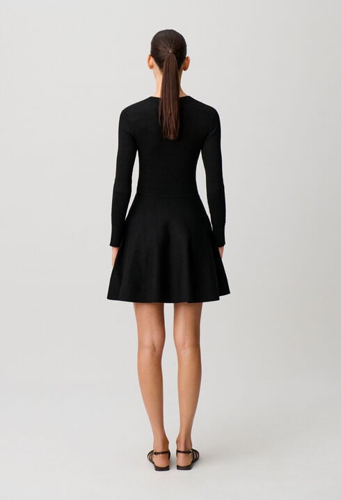 Short knitted dress with knots