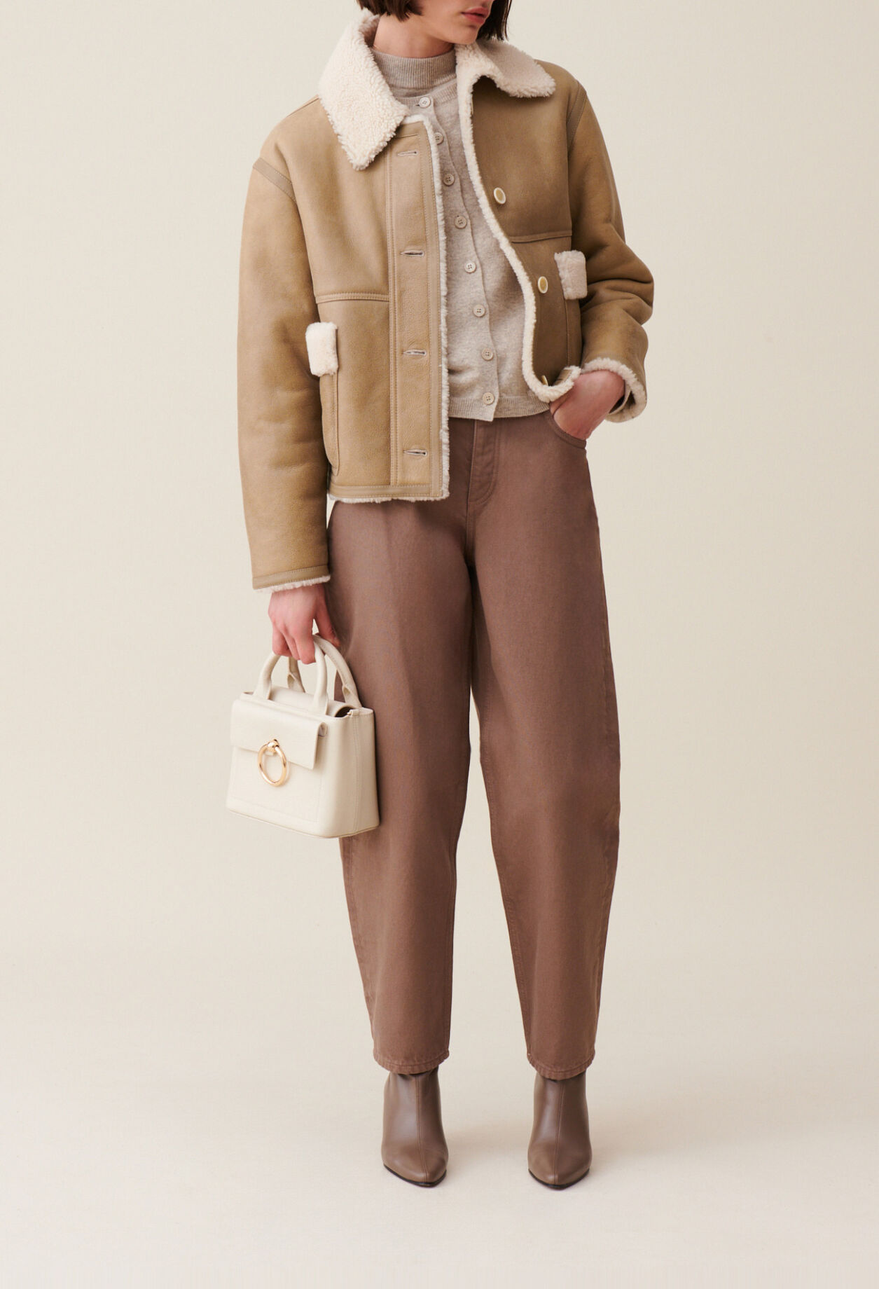 Short beige shearling jacket