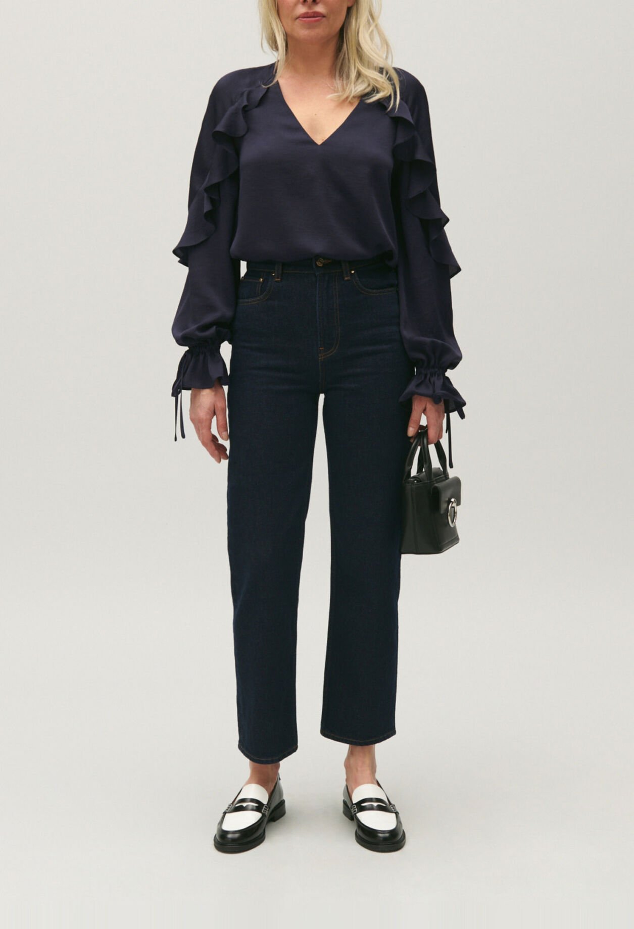 Navy blue ruffled blouse