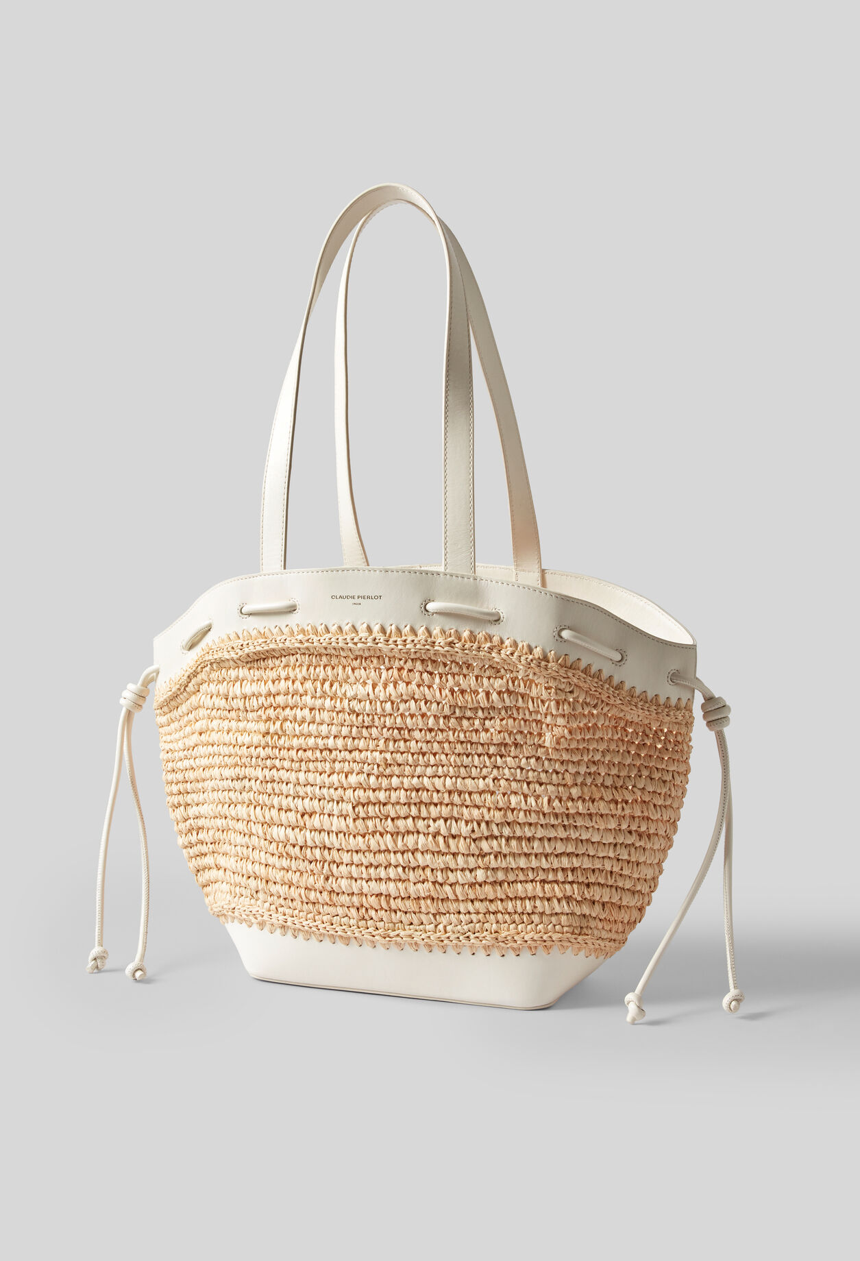 Raffia and leather basket