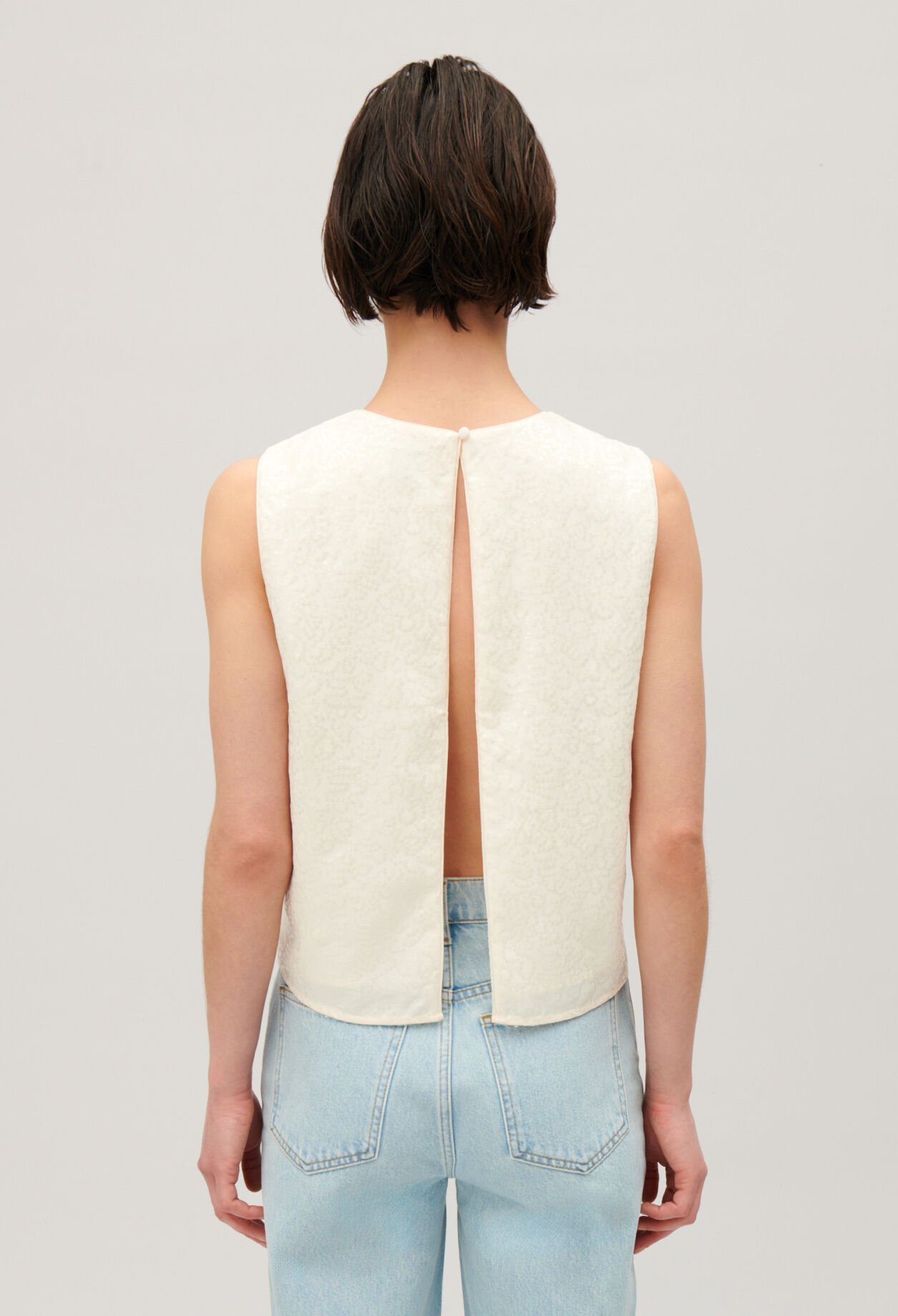 Ecru sequined sleeveless top