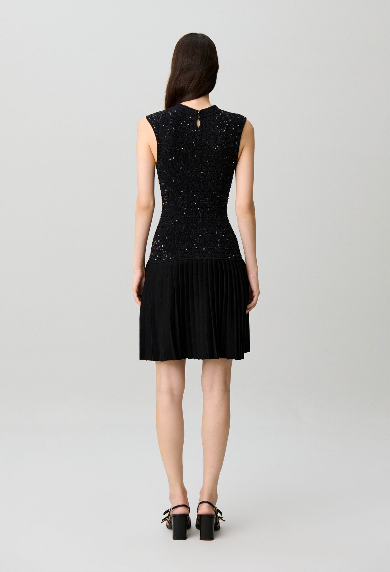 Short fitted sequinned knit dress