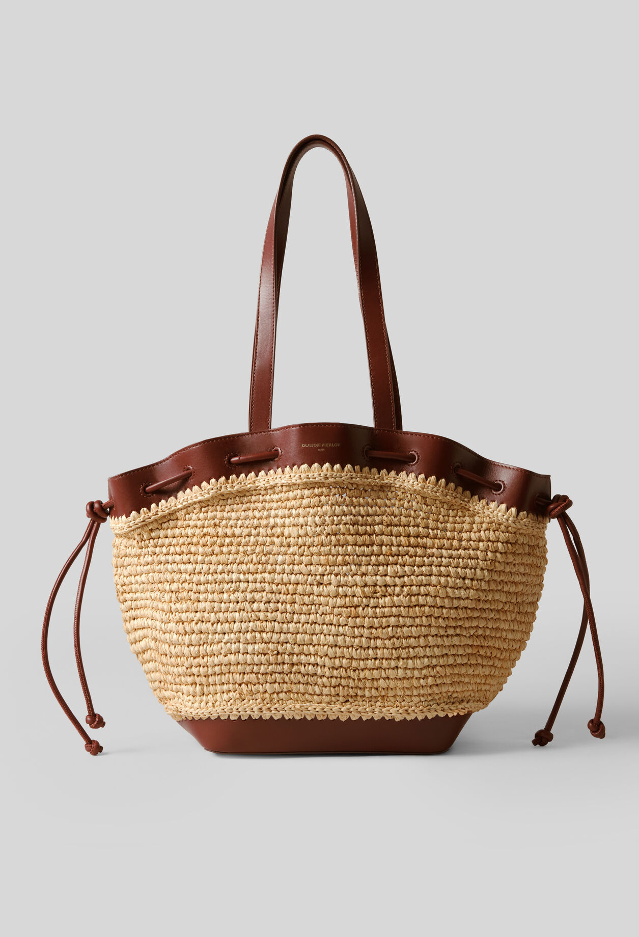 Raffia and leather basket