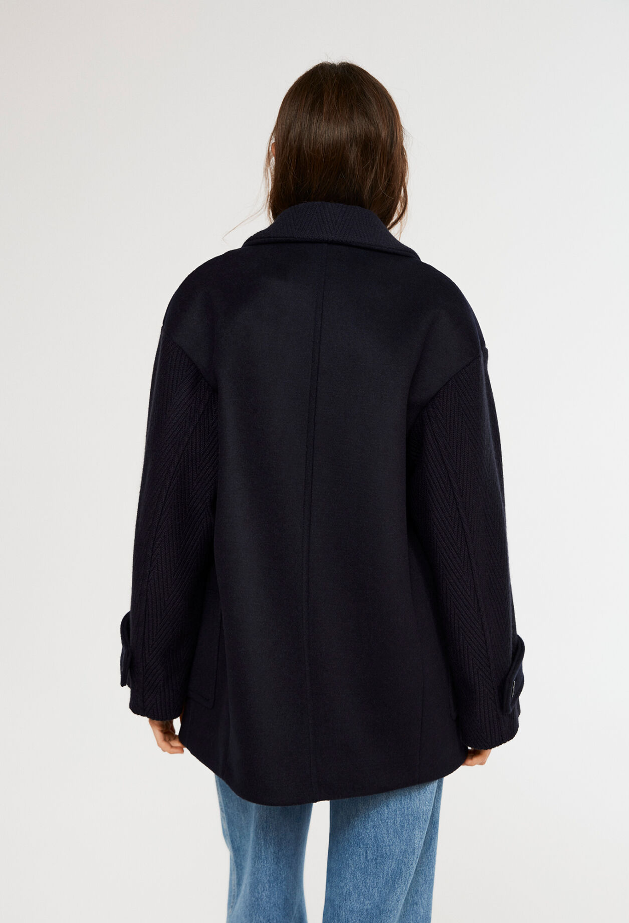 Dual-material coat from recycled wool