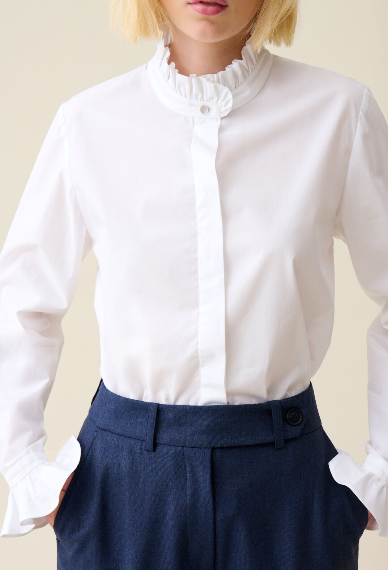 White shirt with ruffled collar