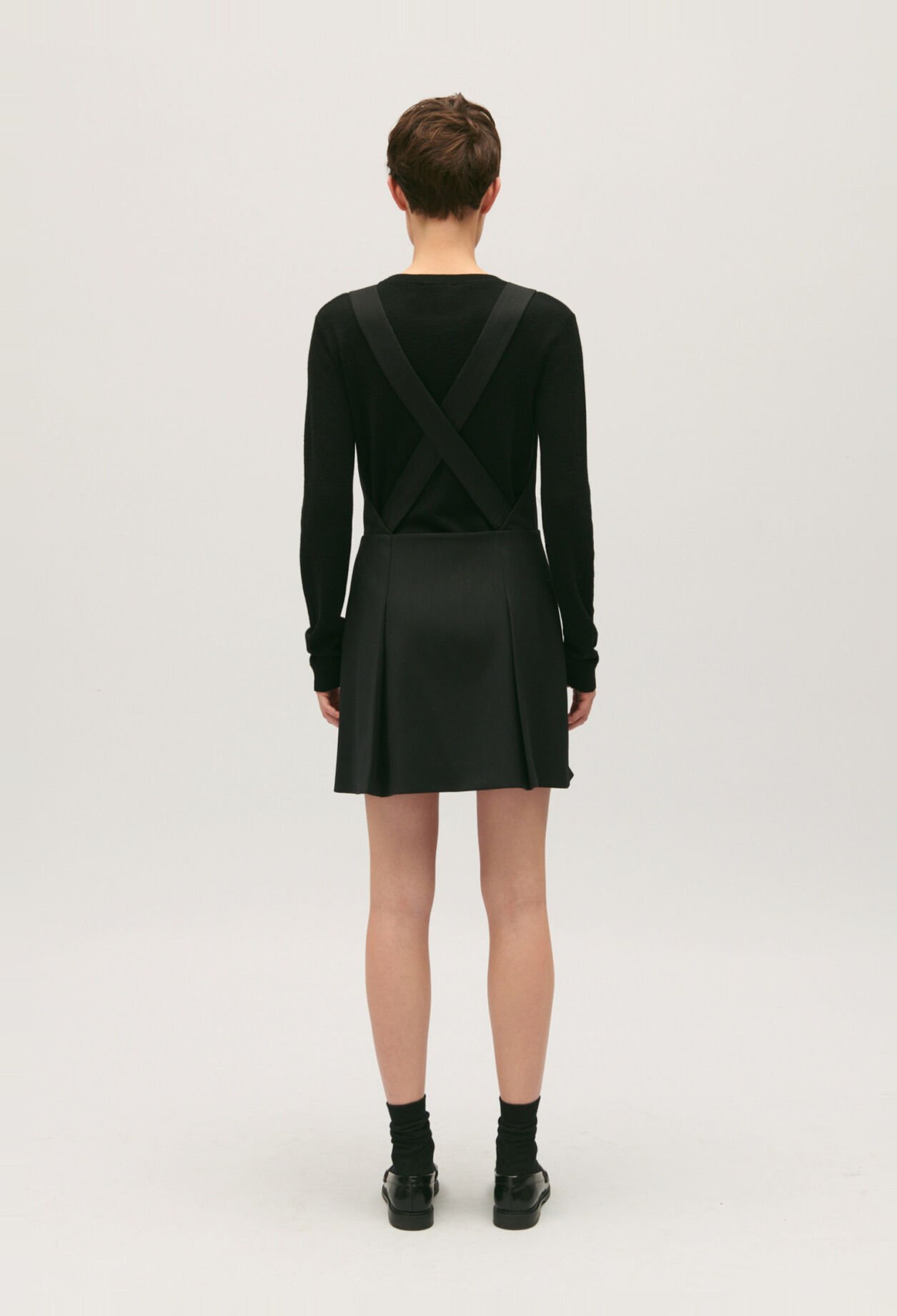 Short black dress with straps