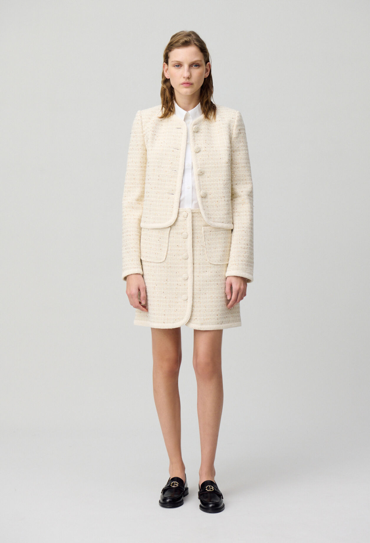Buttoned tweed mini skirt