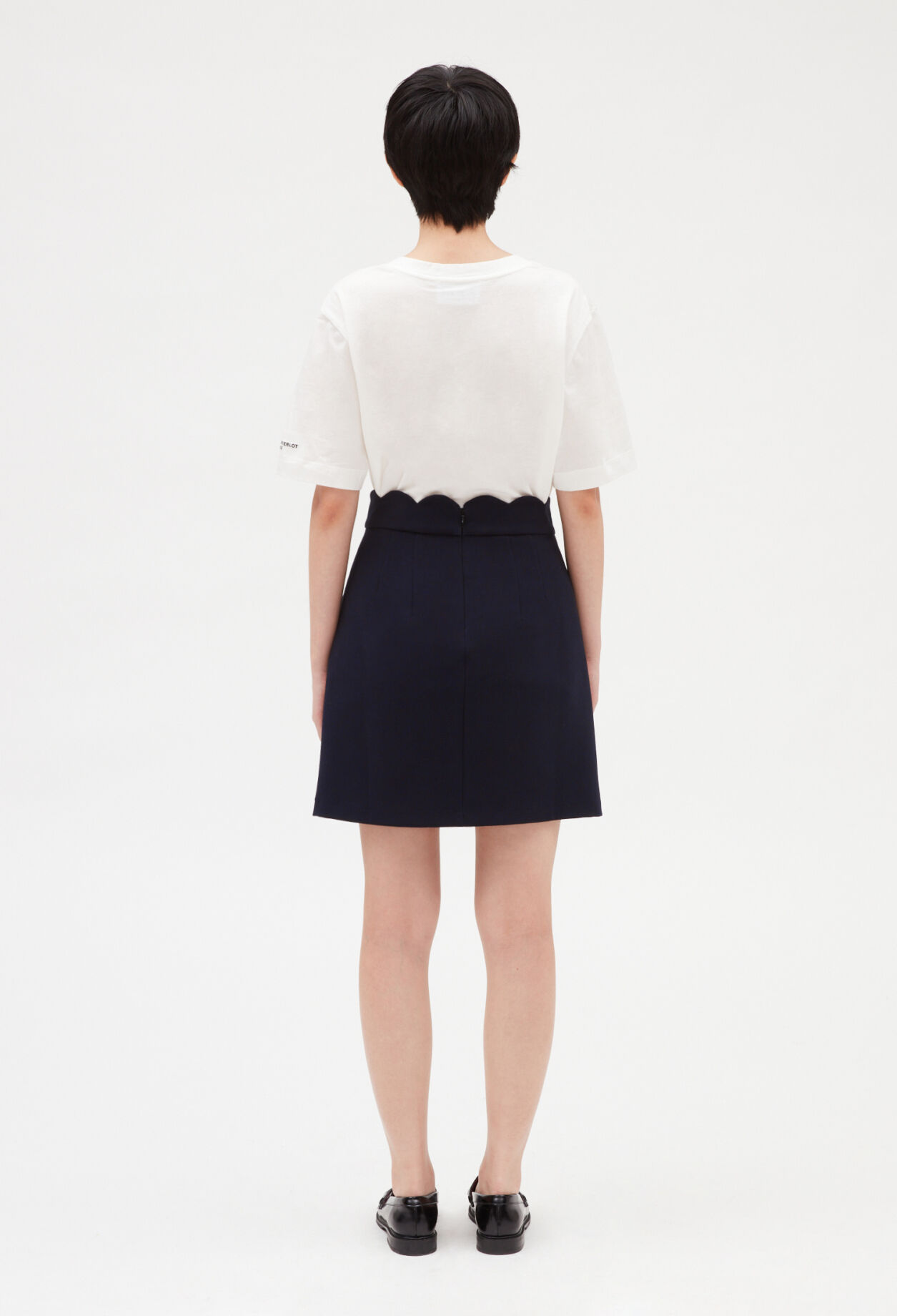 Short skirt with shell details