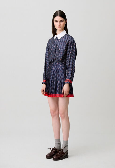 Short pleated satin skirt