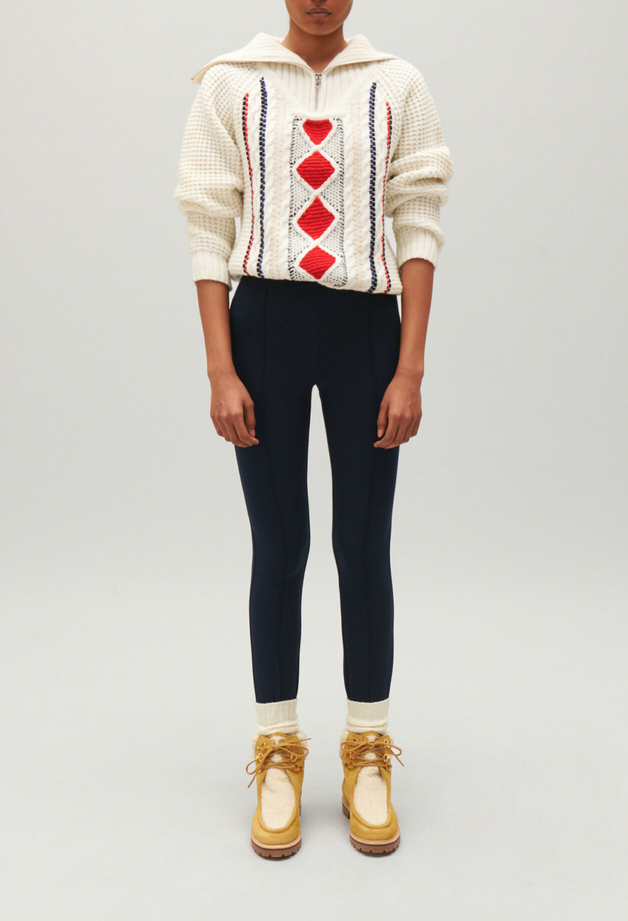 Two-tone knitted jumper zipped rollneck