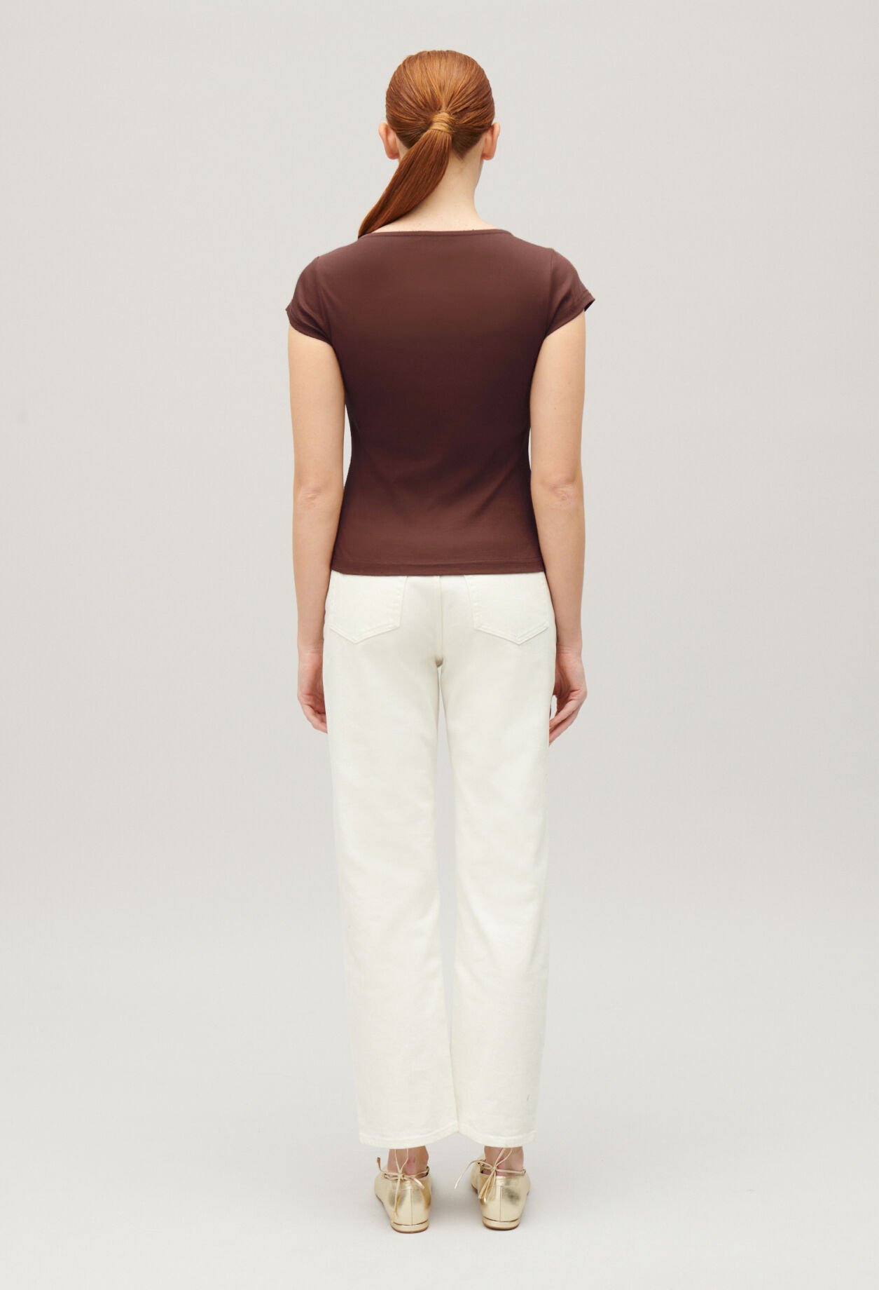 Black asymmetric button-up top