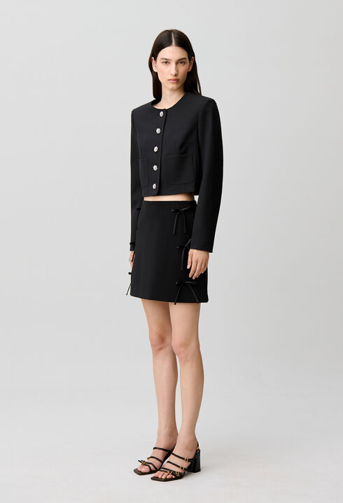 Short jacket with jewel buttons