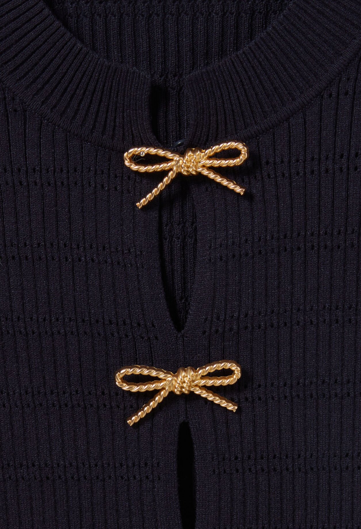 Thin knit jumper with bows