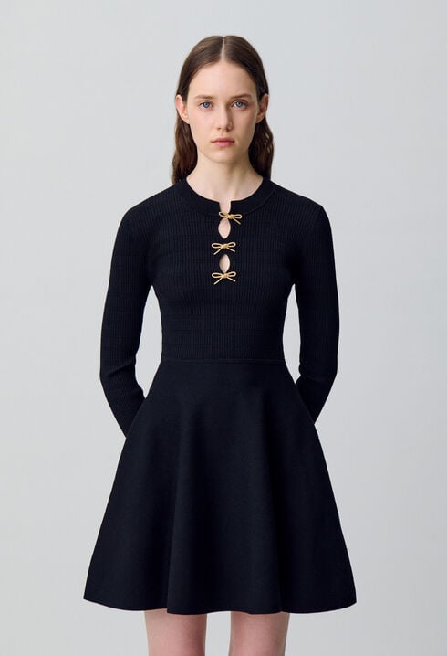 Short knitted dress with knots