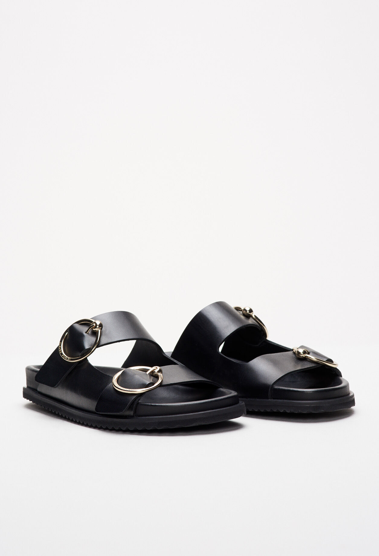 Sandals with metal buckles