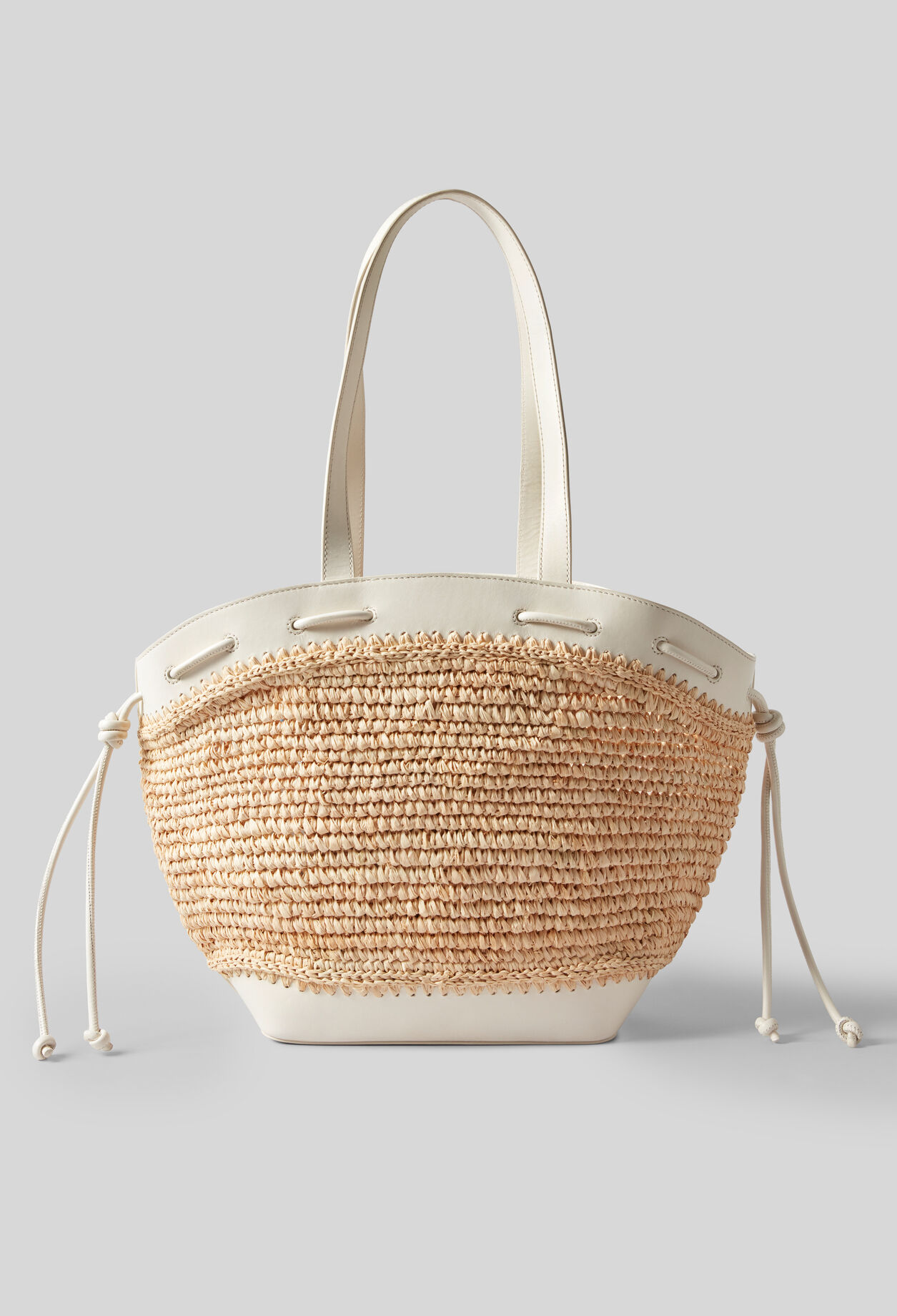 Raffia and leather basket