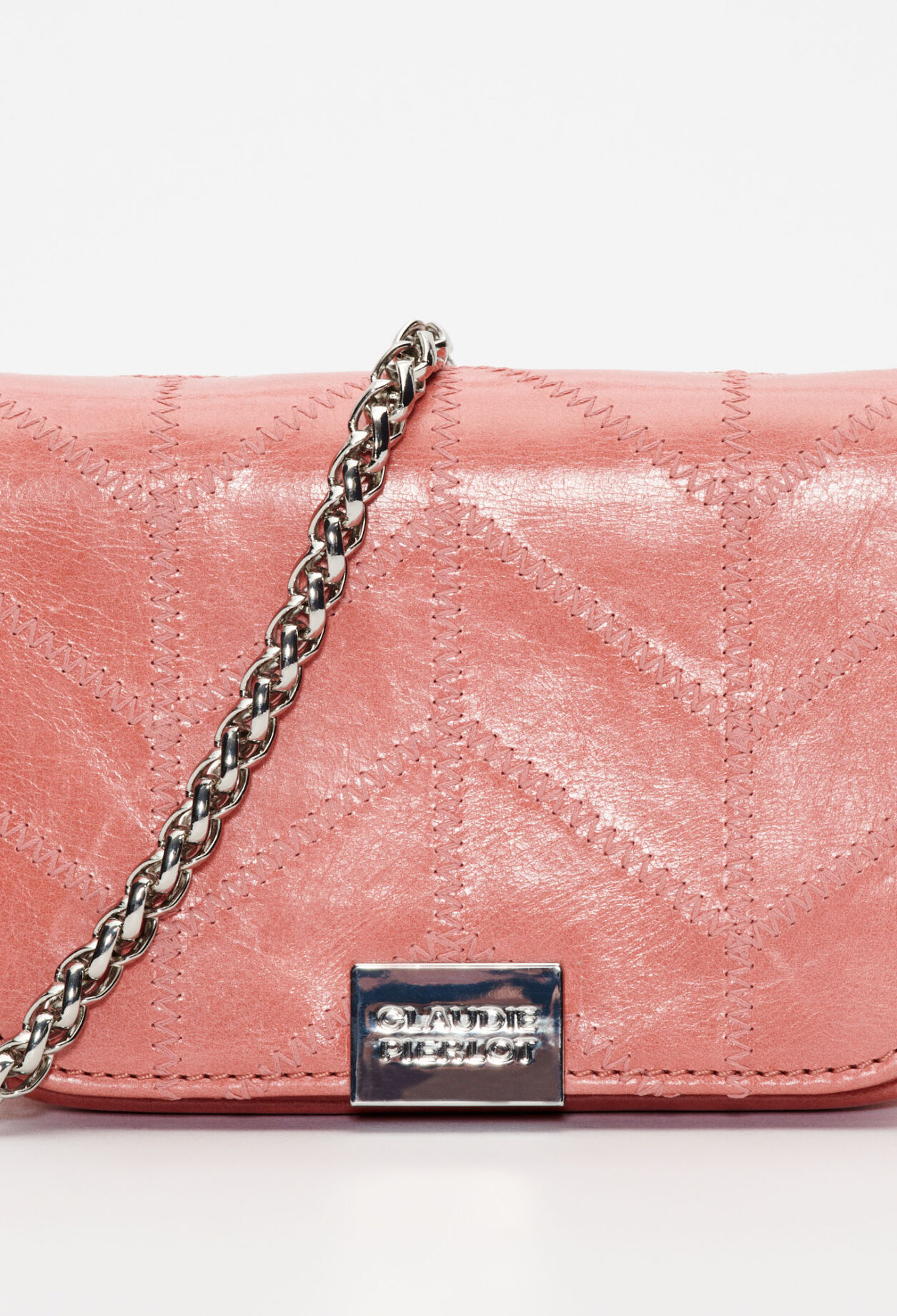 White patent leather clutch bag