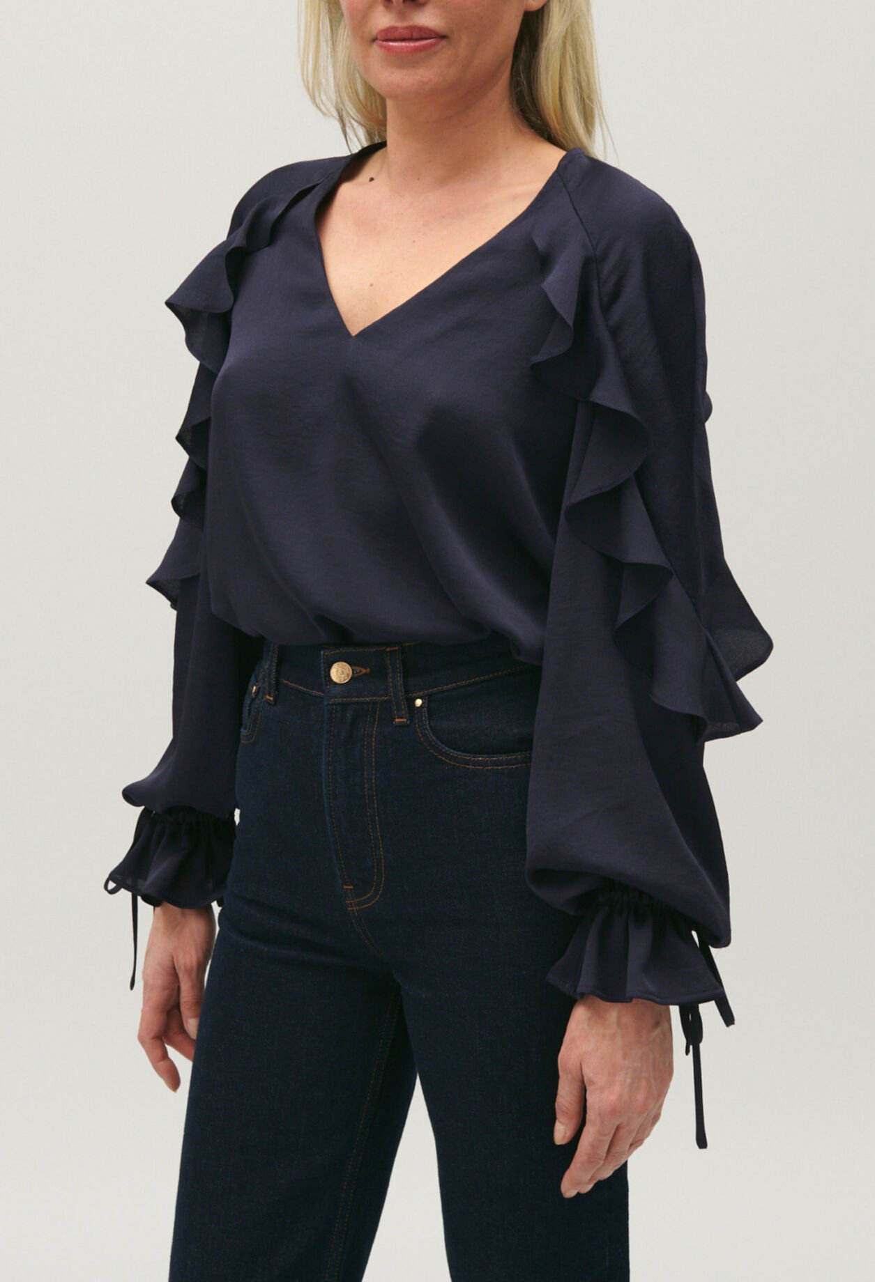 Navy blue ruffled blouse