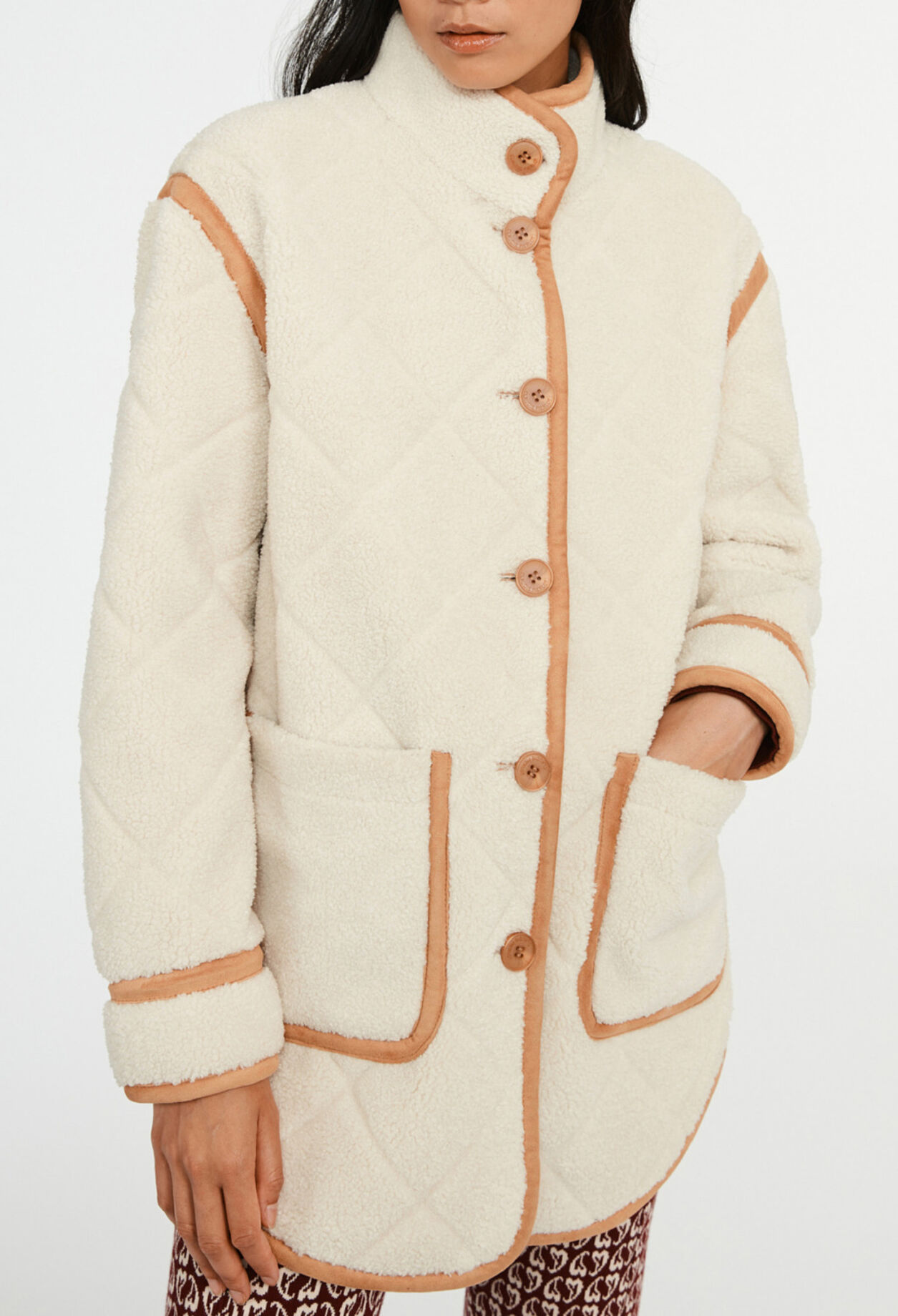 Manteau effet peau lainée
