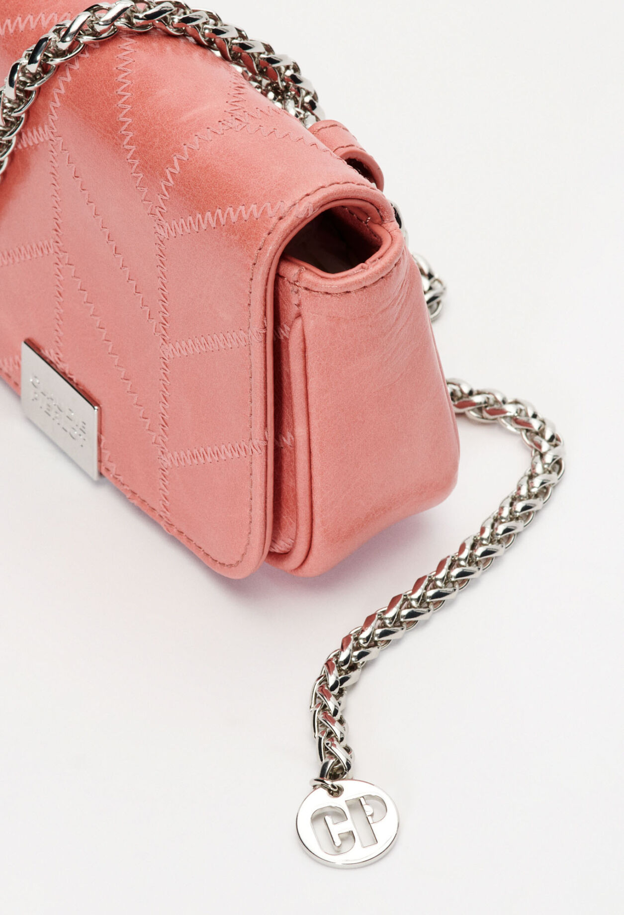 White patent leather clutch bag