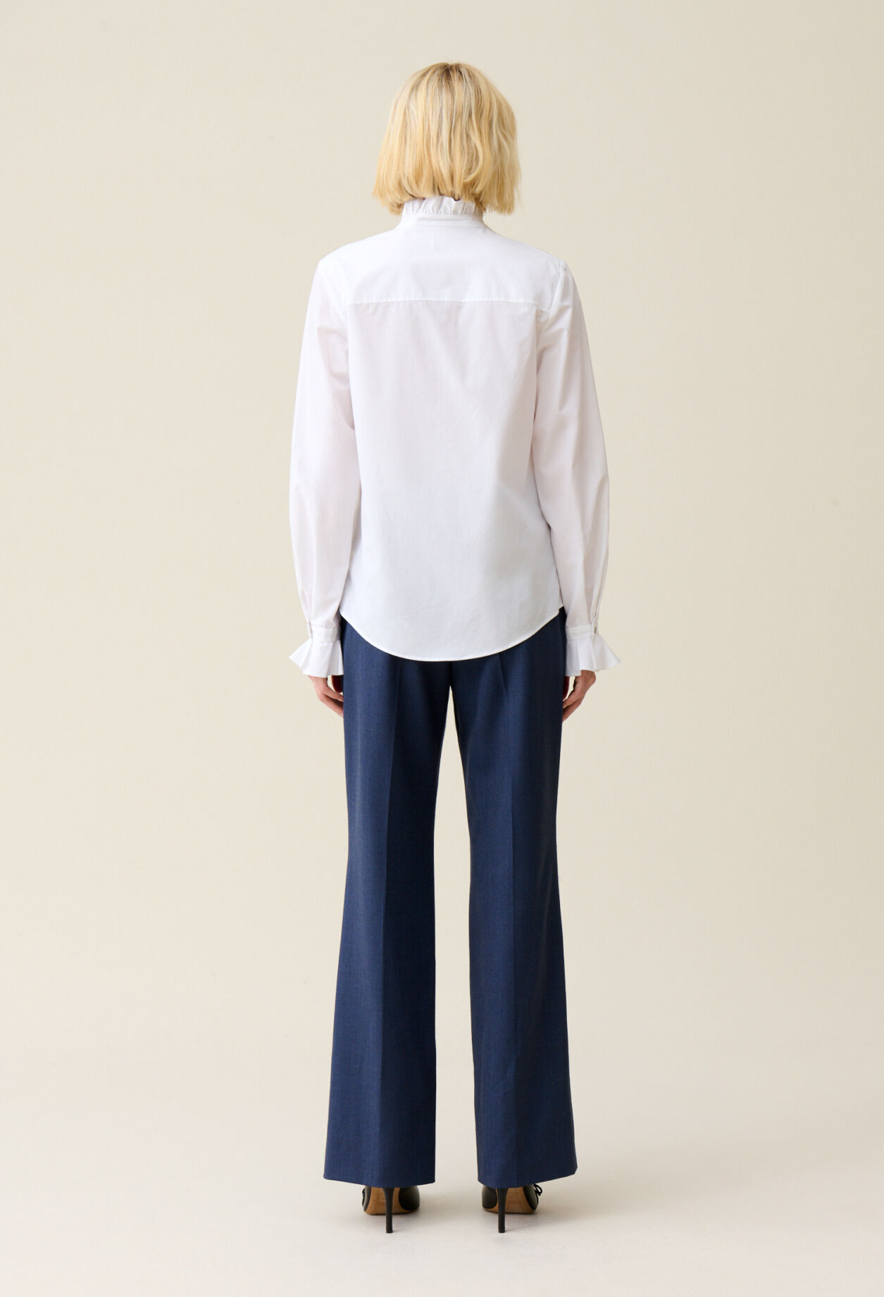 White shirt with ruffled collar