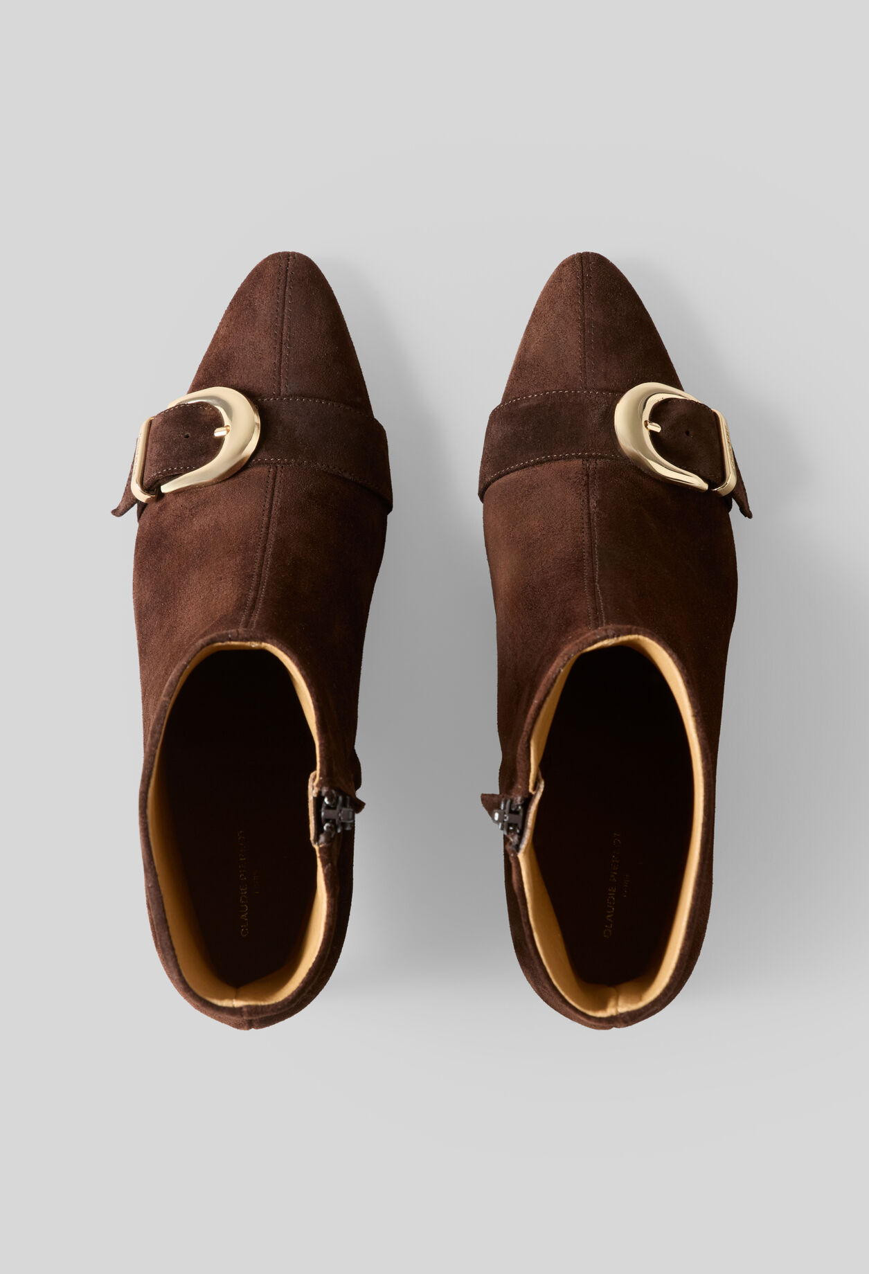 Suede ankle boots with gold buckle