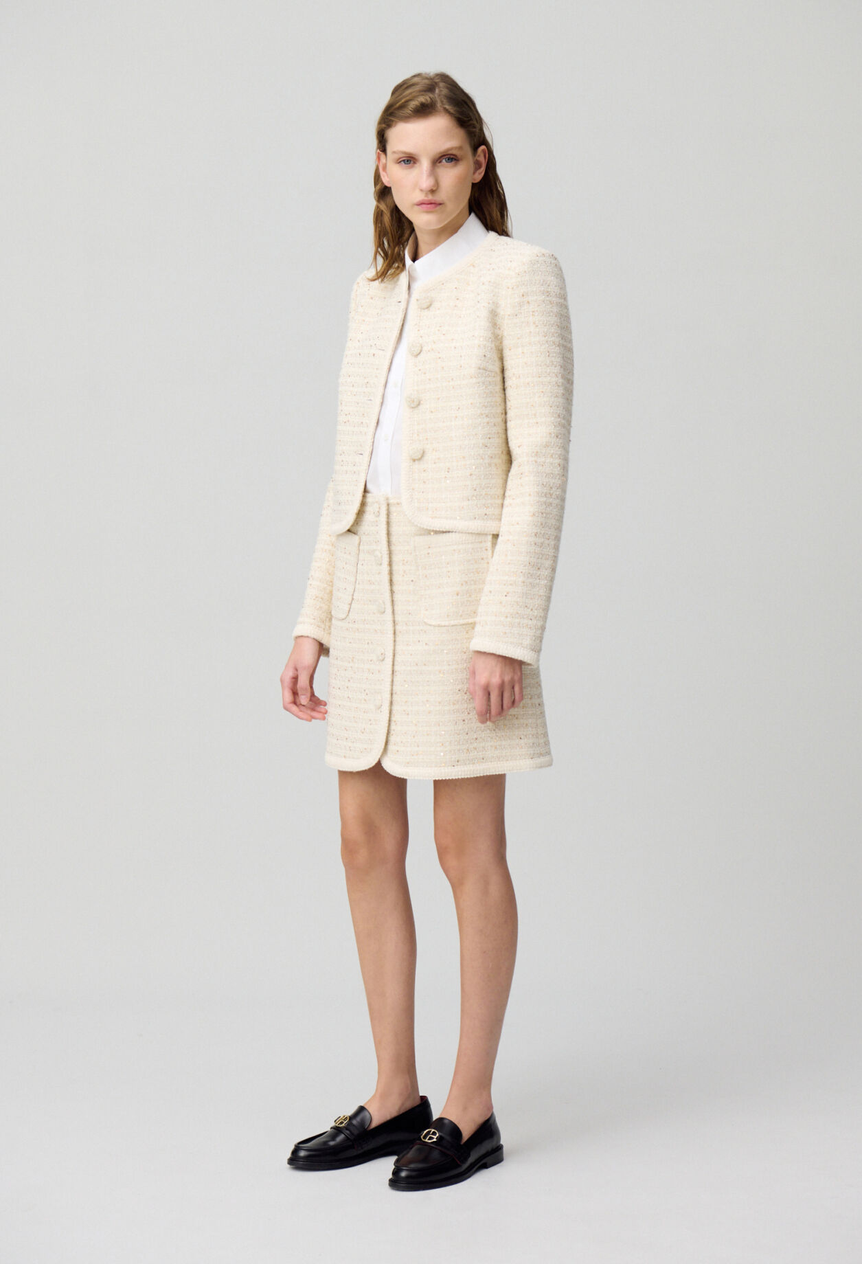 Buttoned tweed mini skirt
