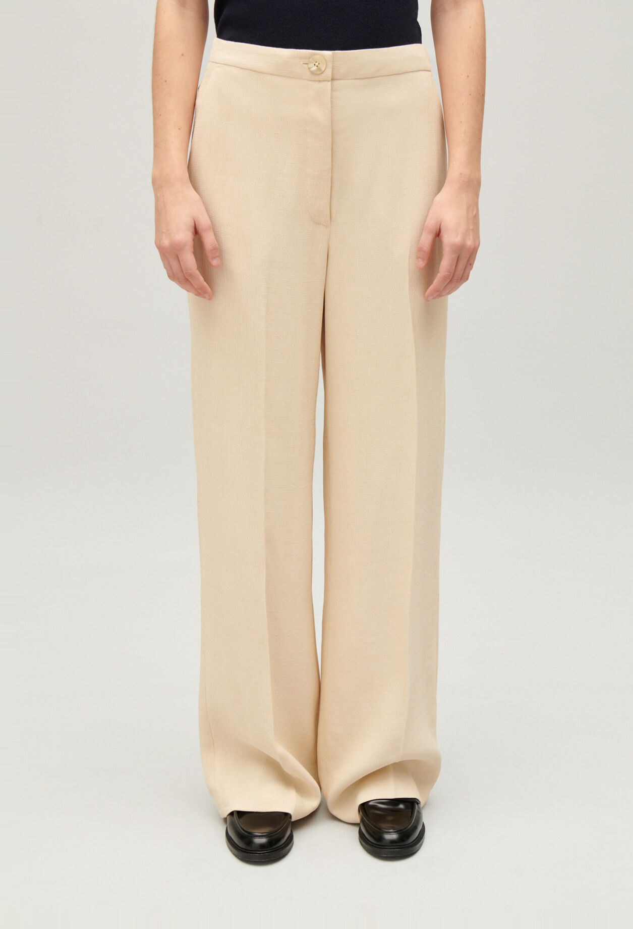 Wide-leg beige trousers