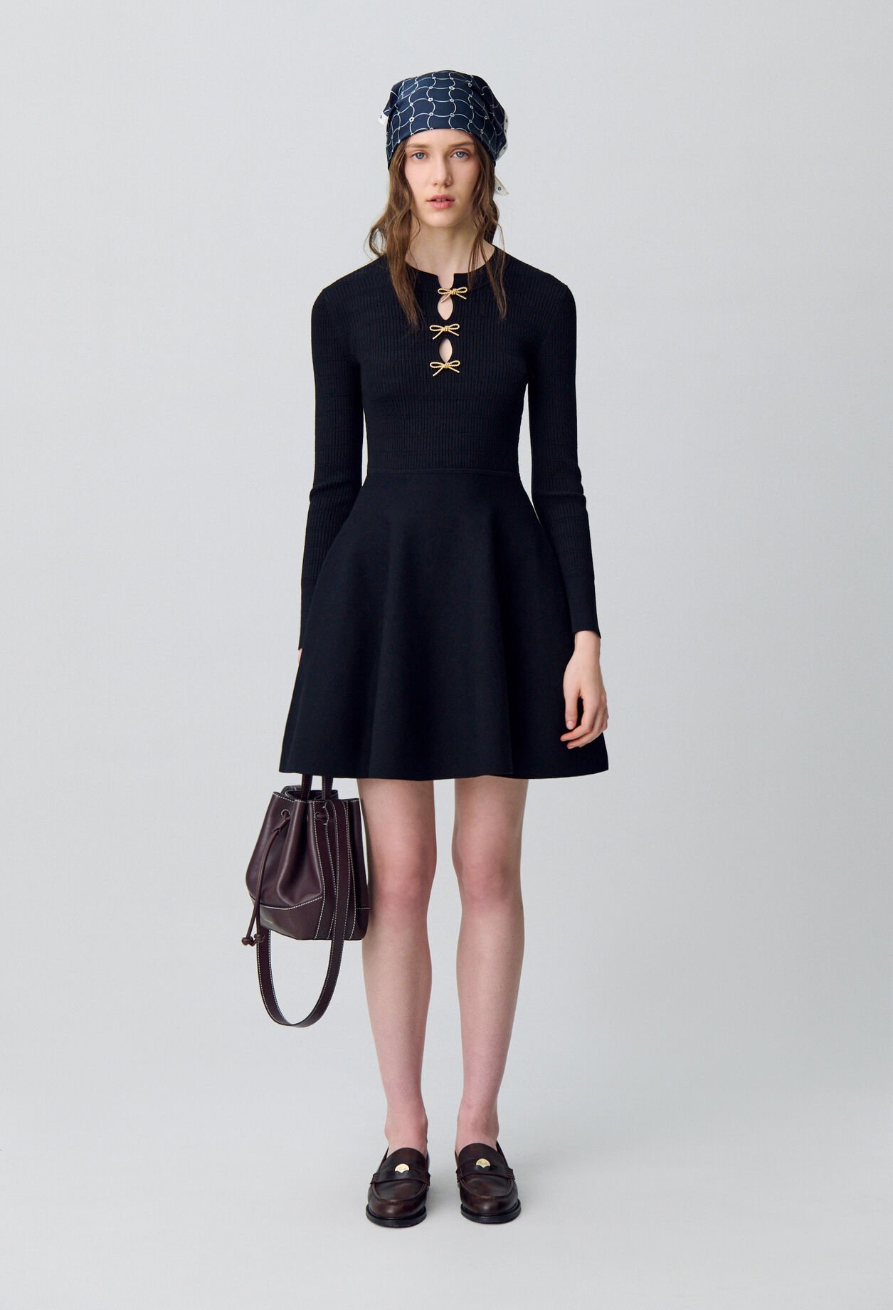 Short knitted dress with knots
